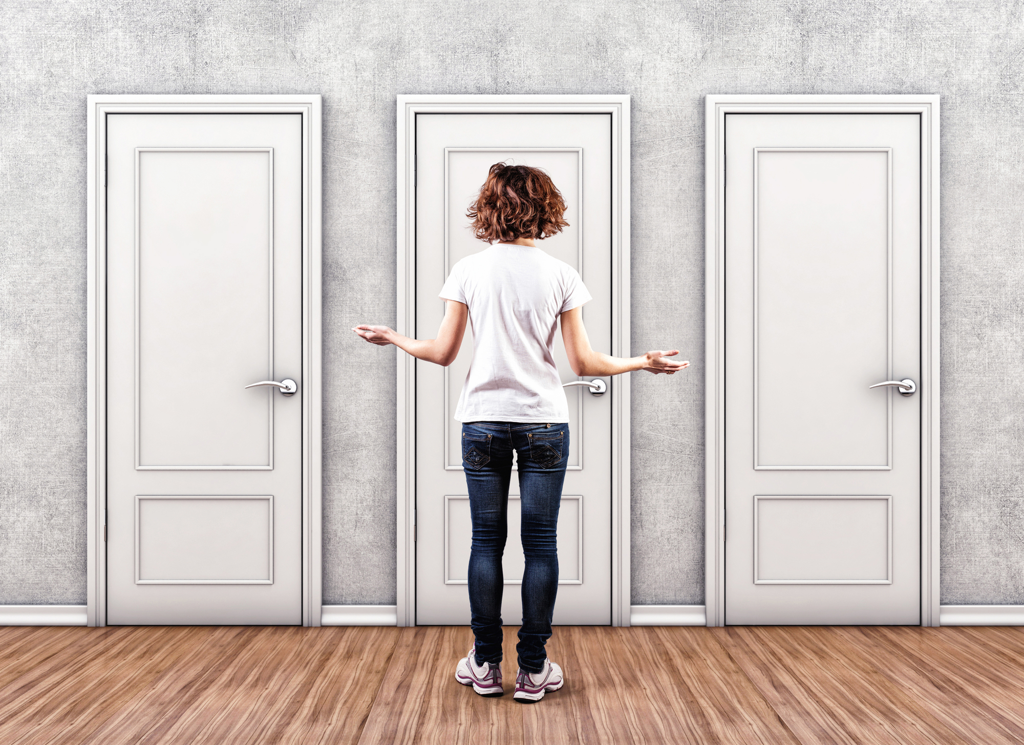 woman in front of three different doors